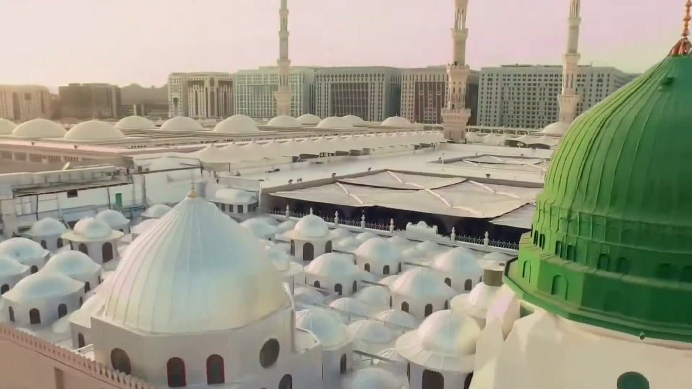 The green dome and the white domes of Masjid an-Nabawi from above, Madinah